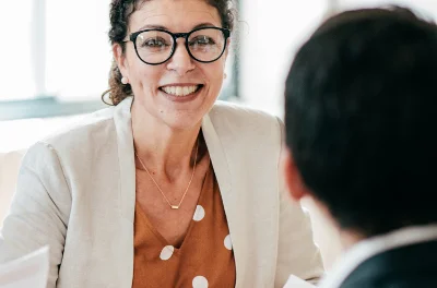 Woman in meeting with man