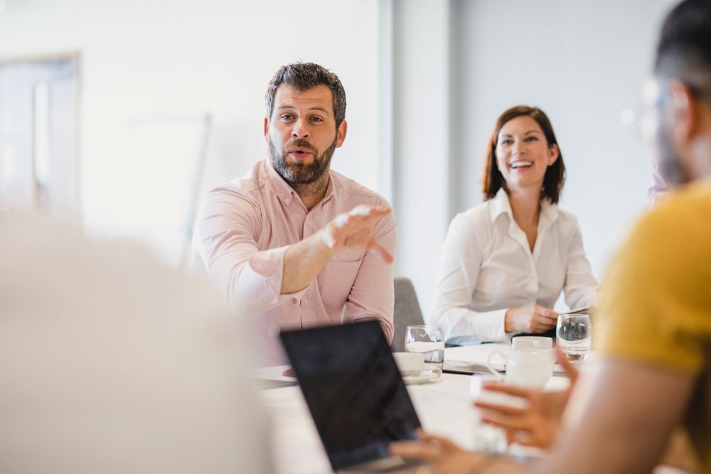 Man talking in a meeting